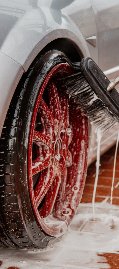tire being washed by a brush